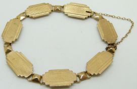A 9ct gold bracelet with Art Deco style engine turned links, 10.5g