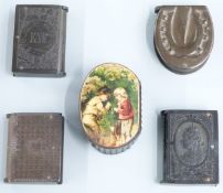 Lacquer snuff box with scene of two boys to lid, together with four early plastic examples formed as