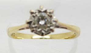 An 18ct gold ring set with a diamond of approximately 0.25ct in an illusion setting, 2.8g, size M/N