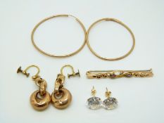 A pair of Victorian 9ct gold earrings, a pair of 9ct gold earrings set with a cubic zirconia, 9ct