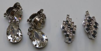 A collection of costume jewellery including faux pearls, two coral necklaces, brooch, marcasite,