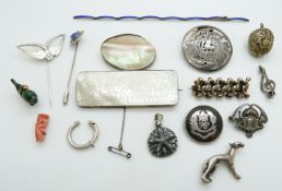 A white metal brooch set with a mother of pearl counter, Zodiac clip, Scottish Rifles brooch, Art