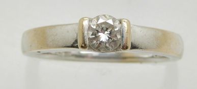 An 18ct gold ring set with a diamond of approximately 0.33ct, 4.4g, size N/O