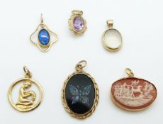 Six 9ct gold pendants including a Victorian cameo, moonstone, amethyst etc