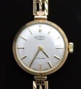 Rotary 9ct gold ladies wristwatch with gold hands and baton markers, silver dial and 17 jewel