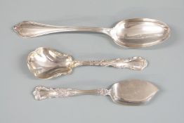 Three pieces of American white metal cutlery comprising table spoon, caddy or sugar scoop and a
