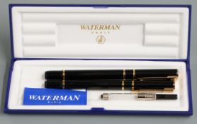 Waterman pen set comprising fountain and ballpoint pens, both with black bodies and gold plated