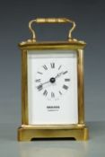 Mann 20thC carriage clock in brass corniche style case, the Roman dial, with Breguet style hands,