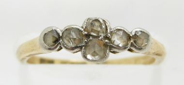An 18ct gold ring set with rose cut and old cut diamonds, 2.2g, size K