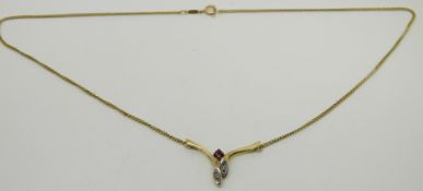 An 18ct gold necklace set with a ruby and diamonds, 3g
