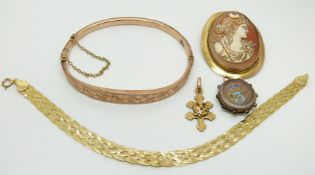 A 9ct gold bangle with engraved foliate decoration, Chester 1914, 9ct gold plaited bracelet (8.