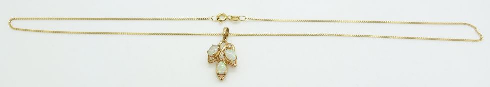 A 9ct gold necklace set with opals, 2.8g