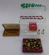 A collection of costume jewellery including a Ciro necklace, earrings, silver filigree necklace