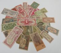 A small collection of world banknotes including c1930 Chinese examples etc