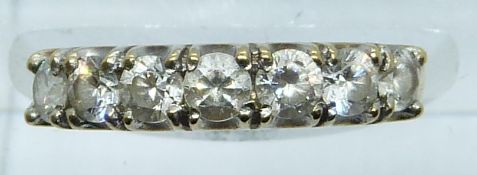 A 9ct gold ring set with cubic zirconia, 1.8g, size J