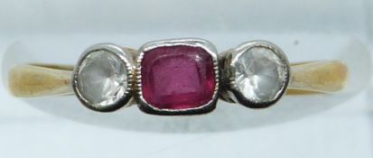 A yellow metal ring set with paste and white sapphires, 1.9g, size N