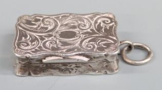 Victorian hallmarked silver vinagrette with engraved decoration and pierced gilt inner cover,
