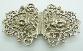 Hallmarked silver belt buckle depicting a classical head, London 1992 maker's mark indistinct,