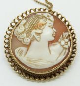 A 9ct gold brooch/ pendant set with a cameo on yellow metal chain