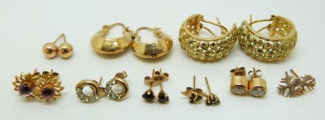 Two pairs of 9ct gold hoop earrings, 9ct gold clover studs set with a sapphire, emerald and ruby