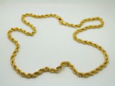 A yellow metal rope twist necklace marked 916, 27.7g