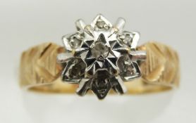 A 9ct gold ring set with diamonds in a cluster, 2.6g, size M