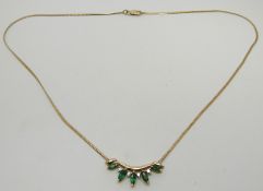A 9ct gold necklace set with five marquise cut emeralds and diamonds, 3.5g