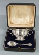 George V cased hallmarked silver two handled porringer or bowl and spoon, London 1930 maker F C