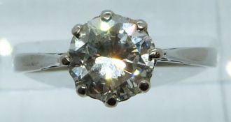 An 18ct white gold ring set with a round cut diamond of approximately 1.8ct, 3.5g, size Q/R