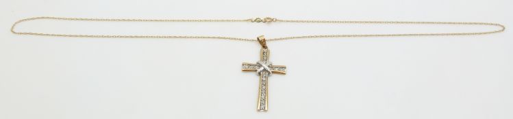 A 9ct gold cross pendant set with diamonds on 9ct gold chain, 2.9g