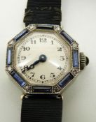 Art Deco 9ct white gold ladies watch, the octagonal face set with baguette cut Montana sapphires and