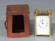 19thC R & C of Paris brass cased carriage clock with enamel Roman dial and spade hands, raised on