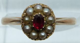 Victorian ring set with a ruby surrounded by seed pearls, 2.5g, size L