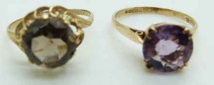 A 9ct gold ring set with amethyst and a 9ct gold ring set with smoky quartz, 4.9g, both size Q