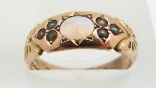 Victorian ring set with an opal and seed pearls, maker W & H, 2g, size L