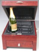 A possibly unused electric wine chiller with bottle of Bucks Fizz within, 750ml, 3.9% vol.