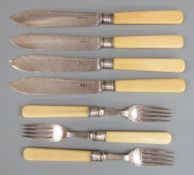 A quantity of Victorian hallmarked silver bladed and tined fish eaters, weight 304g all in