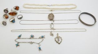 A pearl necklace, silver bangle, silver rings, silver locket etc