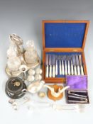 19thC three bottle decanter set on stand, cased set of cutlery, cased nutcrackers, hallmarked silver