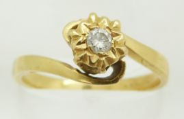 A yellow metal ring set with a diamond, 4.3g, size P