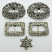A pair of 19thC cut steel buckles, length 6cm, cut steel star and a pair of paste buckles