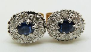 A pair of 9ct gold earrings set with sapphires and diamonds, 1.5g