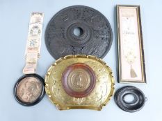 19thC pierced and embossed roundel decorated with classical scenes, framed brass plaque for