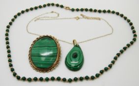 A brooch/pendant set with malachite, a 9ct gold and beaded malachite necklace, a 9ct gold chain