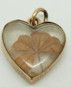 Victorian 9ct rose gold heart pendant set with a four leaf clover, engraved 1898, 2 x 2.2cm