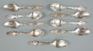 Art Nouveau style set of nine American white metal teaspoons in the lily pattern by the Whiting