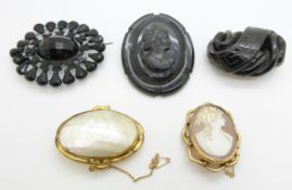 Three Victorian brooches, comprising pinchbeck set with mother of pearl and a cameo brooch