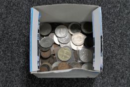 A box containing a quantity of pre-decimal British coinage and crowns