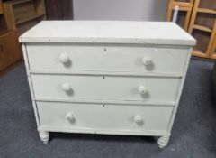 A painted Victorian pine three drawer chest