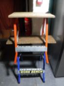 Two folding work benches